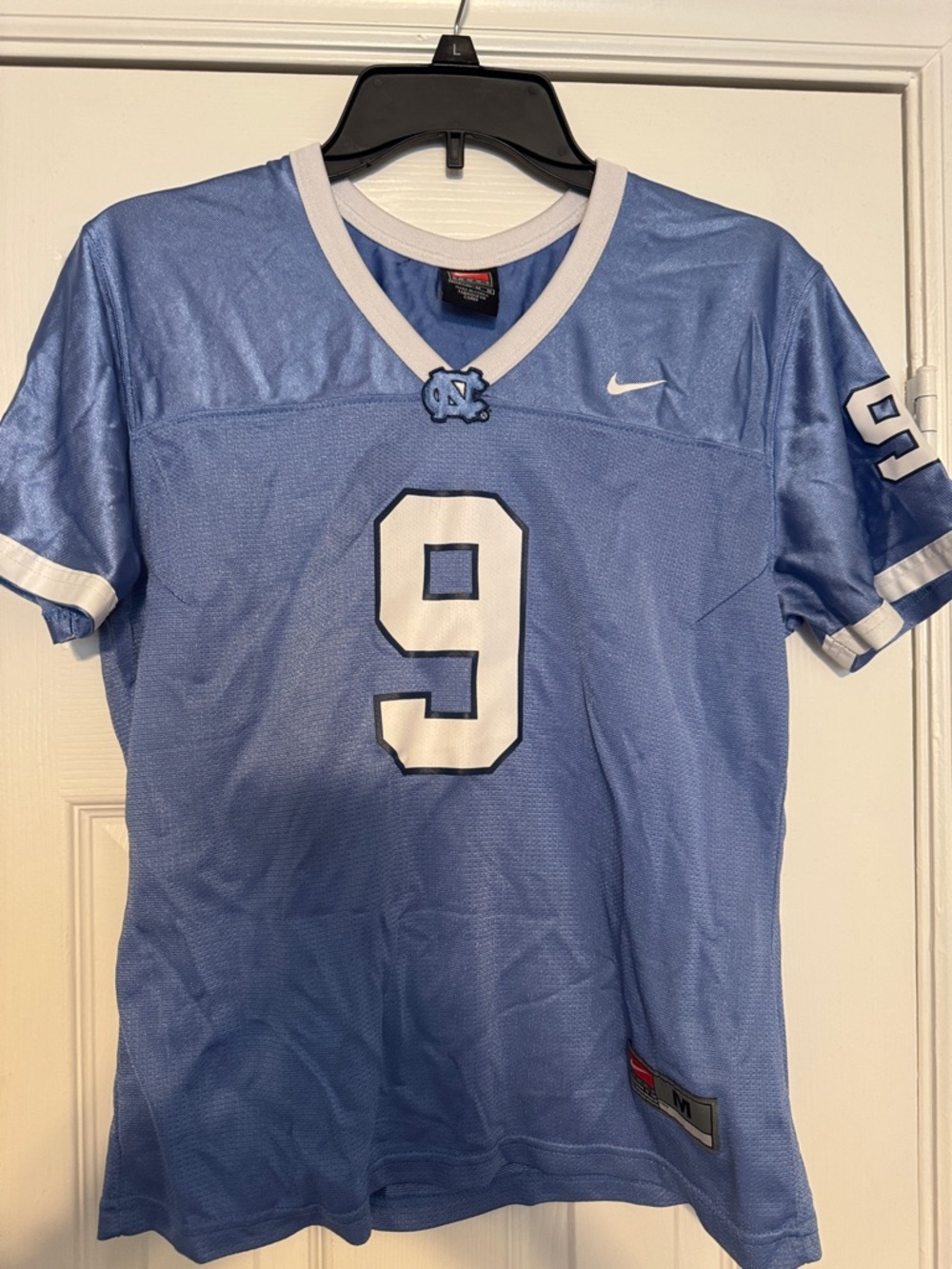 Nike youth Carolina Blue Football Jersey with White Number 9